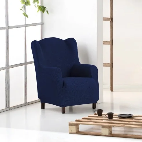 Funda bielástica para sillón orejero Cora | Protección con estilo y ajuste impecable